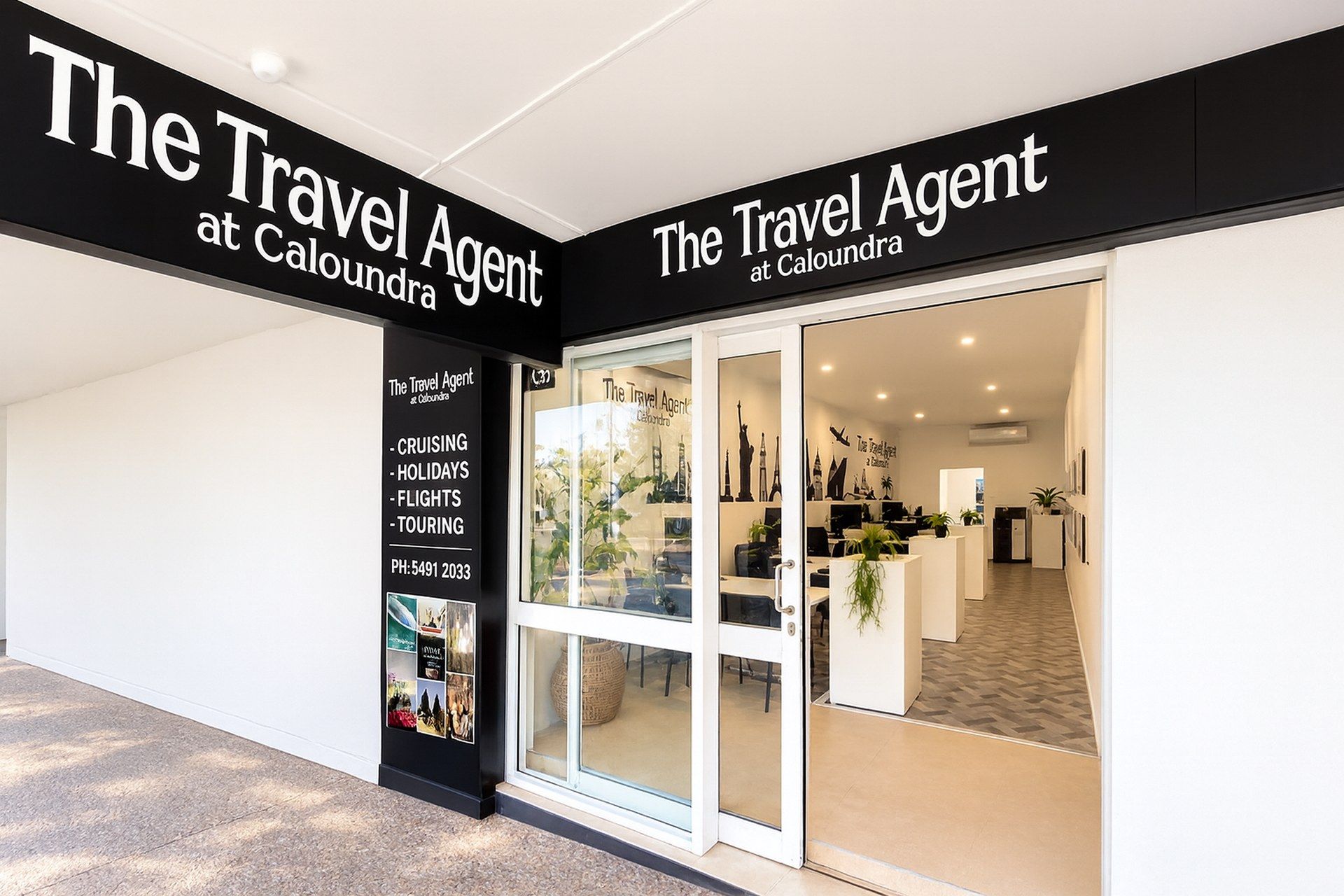 The Travel Agent at Caloundra shopfront on Bulcock Street: black signage over the open door, and a column listing cruising, holidays, flights and touring