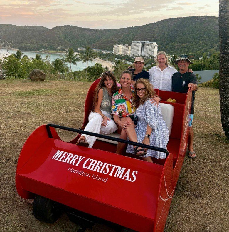 The team on a Christmas sleigh on Hamilton Island
